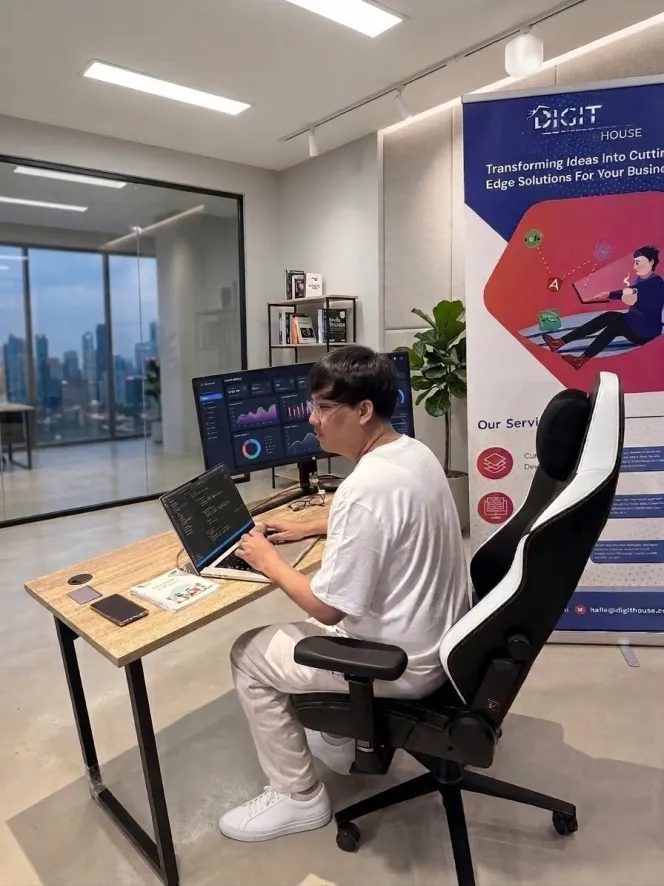 Group of people working around a table